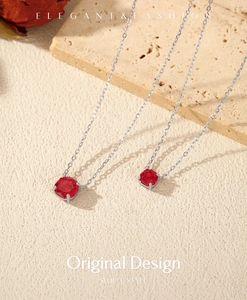 Detail of red garnet octagon pendants in S925 silver with elegant four-prong settings