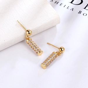 Elegant gold-tone cylindrical drop earrings featuring micro-pave cubic zirconia accents