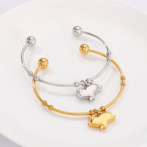 Bracelets ouverts minimalistes en acier titane or et argent avec pendentifs de cochon