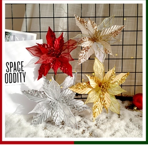 Sparkling Christmas poinsettia flowers with sequins and mesh petals for festive decor