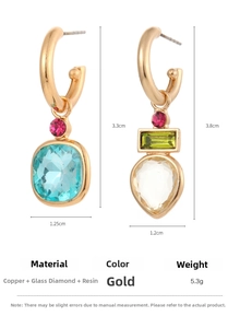 Detail view of geometric gold hoops with faceted crystal charms and size measurements