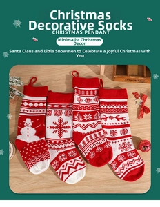Detail of four knitted Christmas stockings with snowman and reindeer patterns