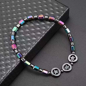 Rainbow magnetic hematite beads bracelet with star pattern on leather jewelry box