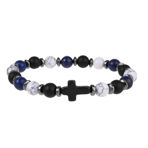 Close-up of black cross charm on natural snowflake and hematite stone beaded bracelet