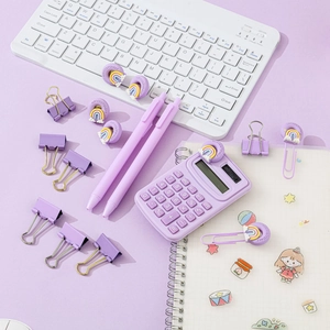 Lavender purple stationery set including mini calculator, pens and colorful binder clips