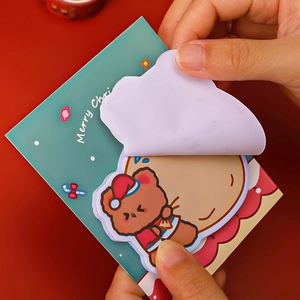 Christmas themed sticky notes with cute cartoon bear and cloud design on red background