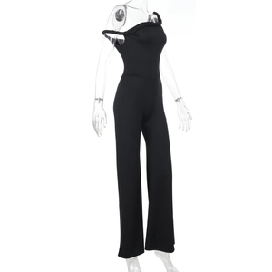 Detail view of black one-shoulder jumpsuit with wide leg trousers and slim fit design