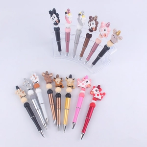 Creative cartoon animal beaded pens featuring silicone charms and colorful plastic barrels