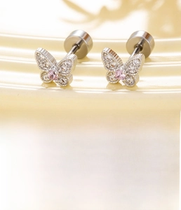 Detail of silver butterfly stud earring with white and pink cubic zirconia stones