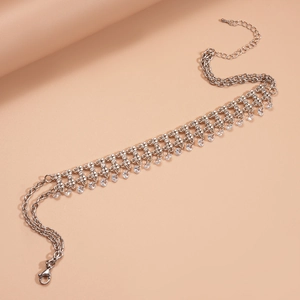Elegant multi-layer silver choker with zircon tassel drops and luxury crystal accents