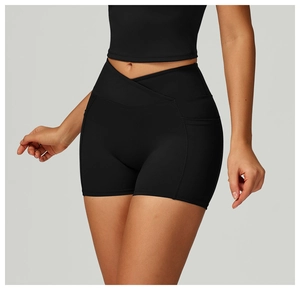 Detail of high-waist yoga shorts with V-cross waistband and convenient side pockets