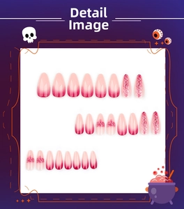 Detail of pink gradient Halloween press-on nails with stitch patterns and almond shape