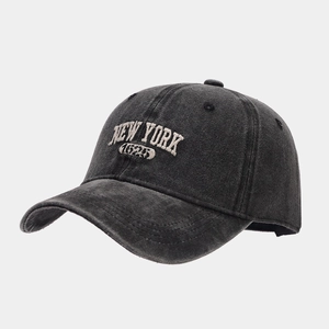 Detail of vintage washed gray cotton baseball cap featuring New York 1625 embroidery