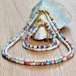 Bohemian colorful Heishi bead necklace and bracelet set with golden spacers and clasp