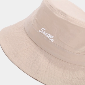 Beige foldable quick-dry bucket hat with Seattle embroidery and breathable sun protection