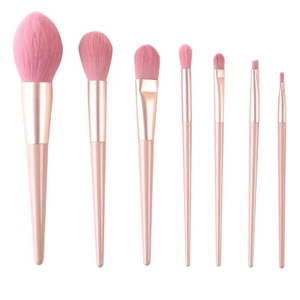 Detailed view of 8-piece pink makeup brush set with soft bristles and glossy handles