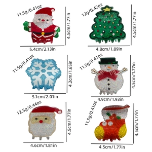 Christmas hair clips set with Santa, tree, and snowman designs made of glittery acrylic