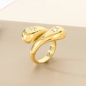 Detailed view of 18K gold plated ring featuring double drop motifs and star-cut stones