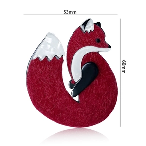 Detailed view of red and white fox acrylic brooch showing 53mm by 60mm dimensions