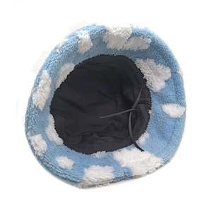 Blue plush bucket hat with white cloud pattern and adjustable chin strap for women