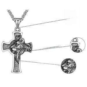 Detailed view of Gothic lion head cross necklace in stainless steel with retro finish
