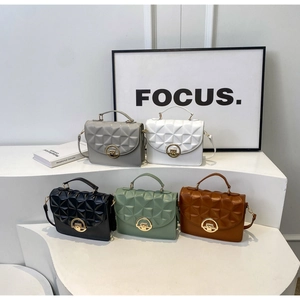 Detailed display of five colorful quilted crossbody bags with golden round metal locks