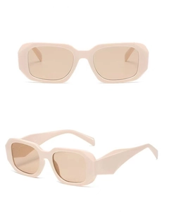 Detail view of retro square beige sunglasses with thick frames from multiple angles