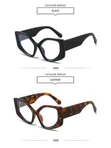 Detail view of black and leopard print cat eye sunglasses with thick temples