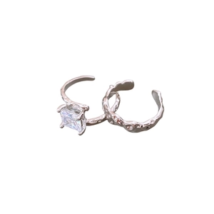 Silver textured open rings set with square zircon featuring lava-style irregular patterns