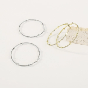 Grandi orecchini a cerchio chic con stelle scintillanti in finiture oro e argento