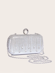 Silver rhinestone evening clutch bag with tassel fringe and crystal ring handle design