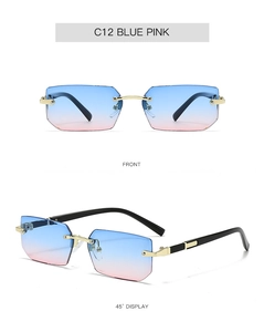 Detail view of rimless square sunglasses with blue-pink gradient lenses and gold bridge