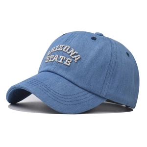 Detail of Arizona State grey 3D embroidery on a washed light blue denim baseball cap