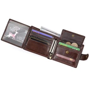 Detailed interior of vintage brown leather wallet with card slots and coin pocket