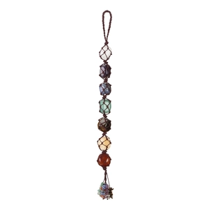 Detailed close-up of seven chakra raw crystals woven in brown rope for car hanging decor