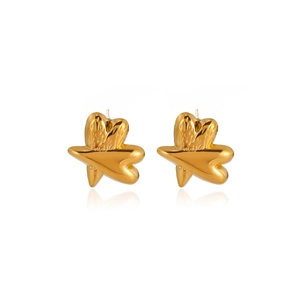 Macro shot of gold-plated starfish pearl earrings with polished textured finish