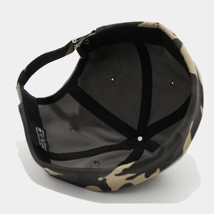 Detail view of 100% cotton inner lining and washing label of camouflage beanie cap