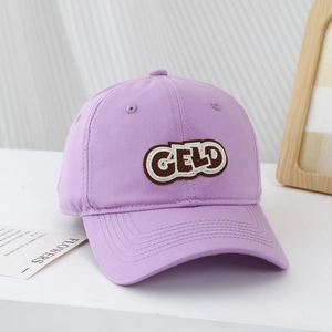 Detail of light purple kids baseball cap with brown CELD letter embroidery and stitching