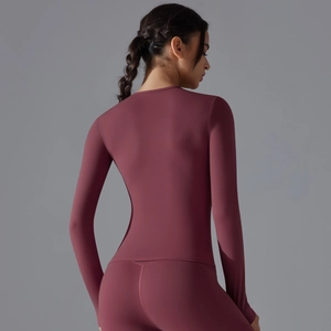 Close-up of seamless stretch yoga top back design in burgundy high-elasticity fabric