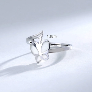 Detailed macro view of silver butterfly ring with 1.8cm diameter sizing labels