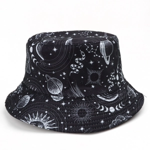 Detailed top view of black bucket hat with white celestial and zodiac prints