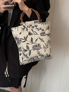 Floral print linen tote bag with natural bamboo handles and vintage dragonfly pattern