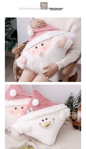 Detailed close-up of fluffy plush Santa Claus pillow with shimmering pink fabric texture