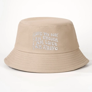 Minimalist khaki cotton bucket hat with white embroidered I AM ENOUGH positive quotes