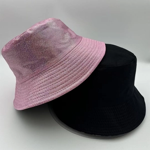 Detail showing pink metallic laser fabric and classic black cotton bucket hats for daily wear