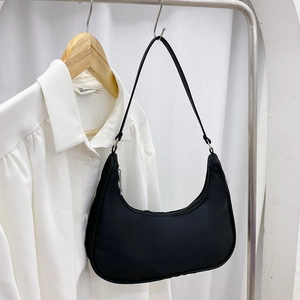 Minimalist black nylon crescent hobo bag for women with comfortable shoulder strap