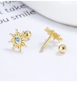 Detail of S925 silver sun stud earring with blue gemstone and screw back closure