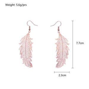 Boucles d'oreilles ailes d'ange en or rose avec paramètres 7,7cm de long et 5,6g