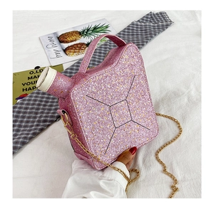 Pink sequin oil-can shaped handbag featuring creative design and golden chain strap