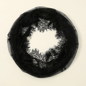 Close-up of black lace mesh infinity scarf featuring delicate floral patterns and textures